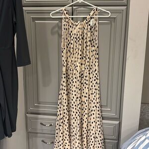 Size 12, like new summer dress with tie in the back of the neck line.